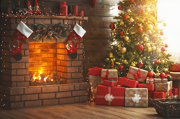 Fireplace with christmas tree.