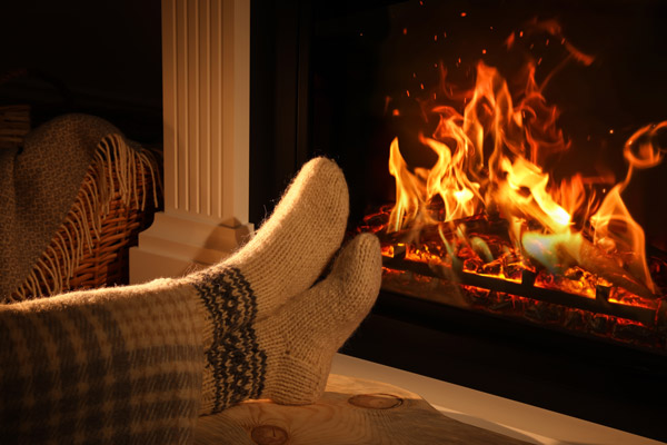 Relaxing by the fireplace.